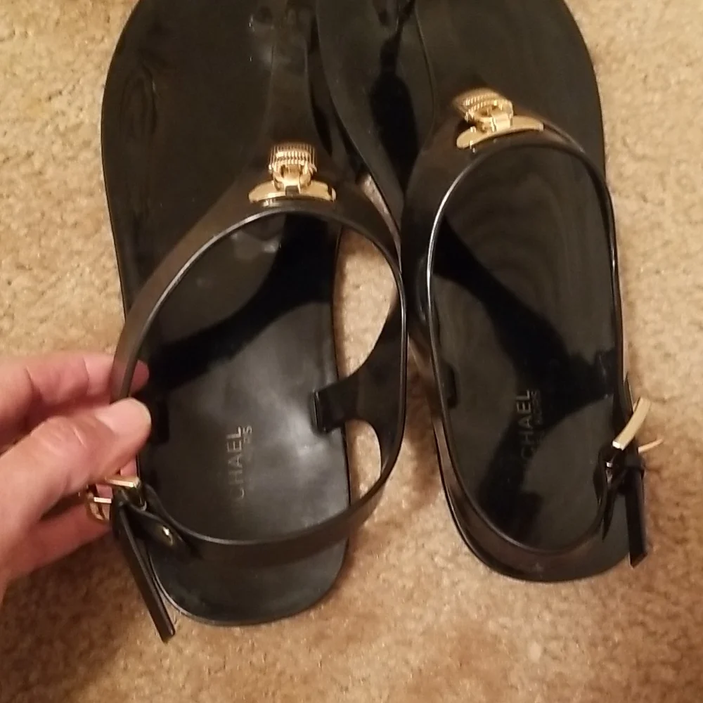 Michael Kors Black Jelly Thong Sandals with Gold Padlock Accent